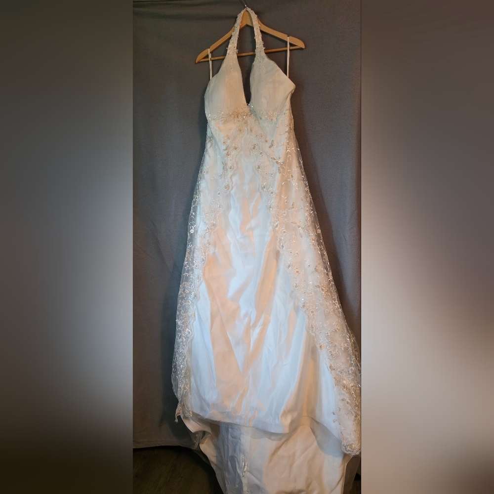 Wedding Gown Elegant Cream Colored with Lace Details.